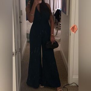 Jumpsuit. Worn once. Back is opened and it’s a tie around neck.